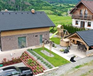 Dvojapartmánový dom pod lyžiarskym svahom Čierny Balog